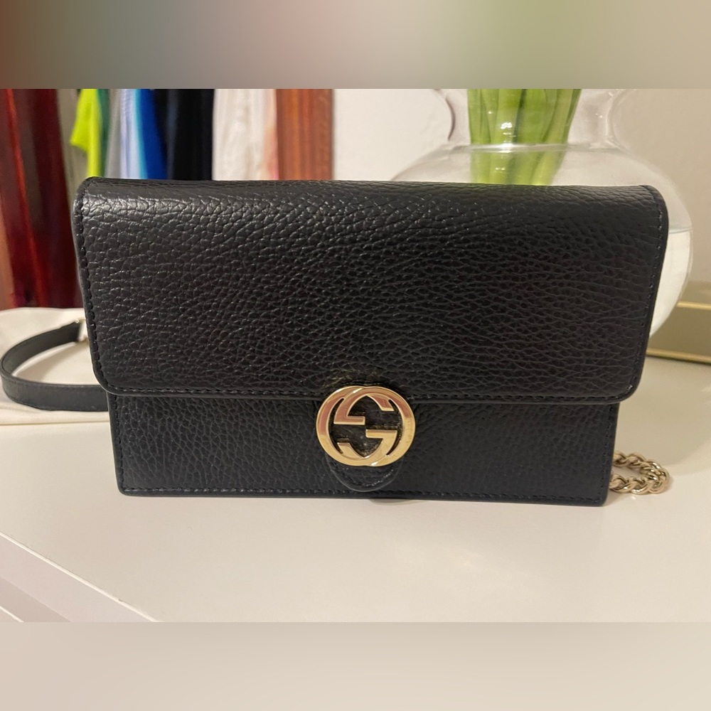 100% authentic GUCCI crossbody, black leather with silver hardware.